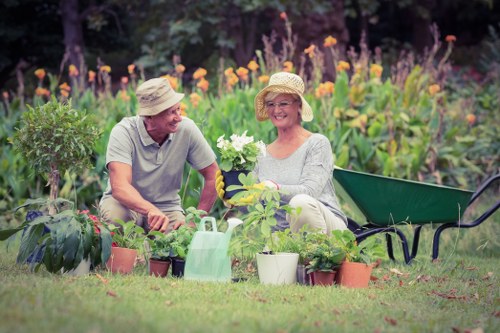 Gardening crew finishing a tidy-up in a Putney backyard